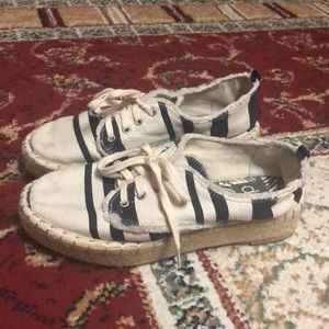 Short platform black and white slip ons